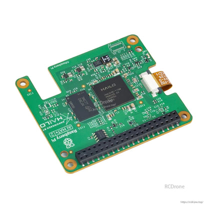 Angled top view of Raspberry Pi AI HAT+2 board showing Hailo chip, ribbon connector, and GPIO header