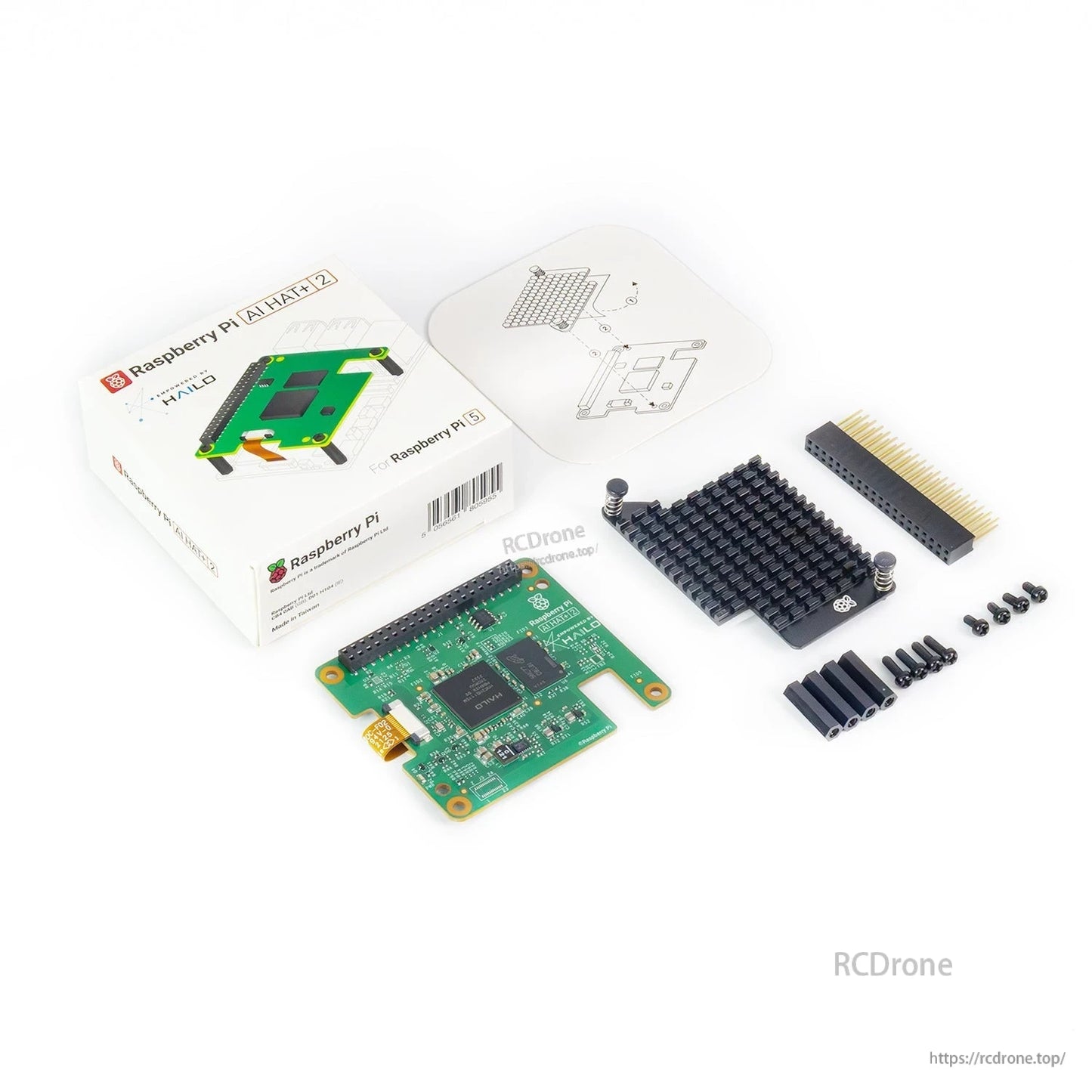 Package contents: AI HAT+2 board, heatsink, GPIO header, standoffs, screws, and quick start sheet