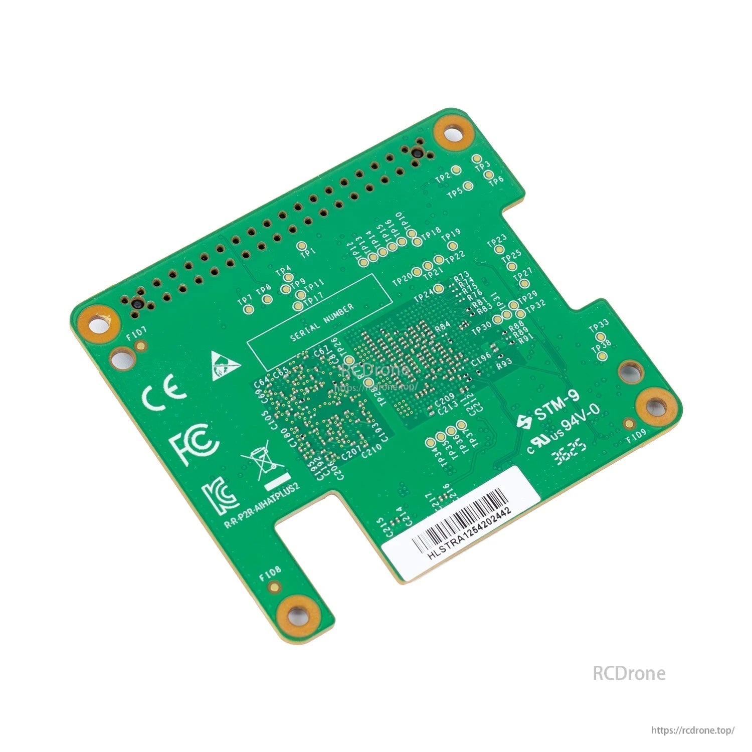 Back side of AI HAT+2 PCB showing certification marks, test pads, and serial label area