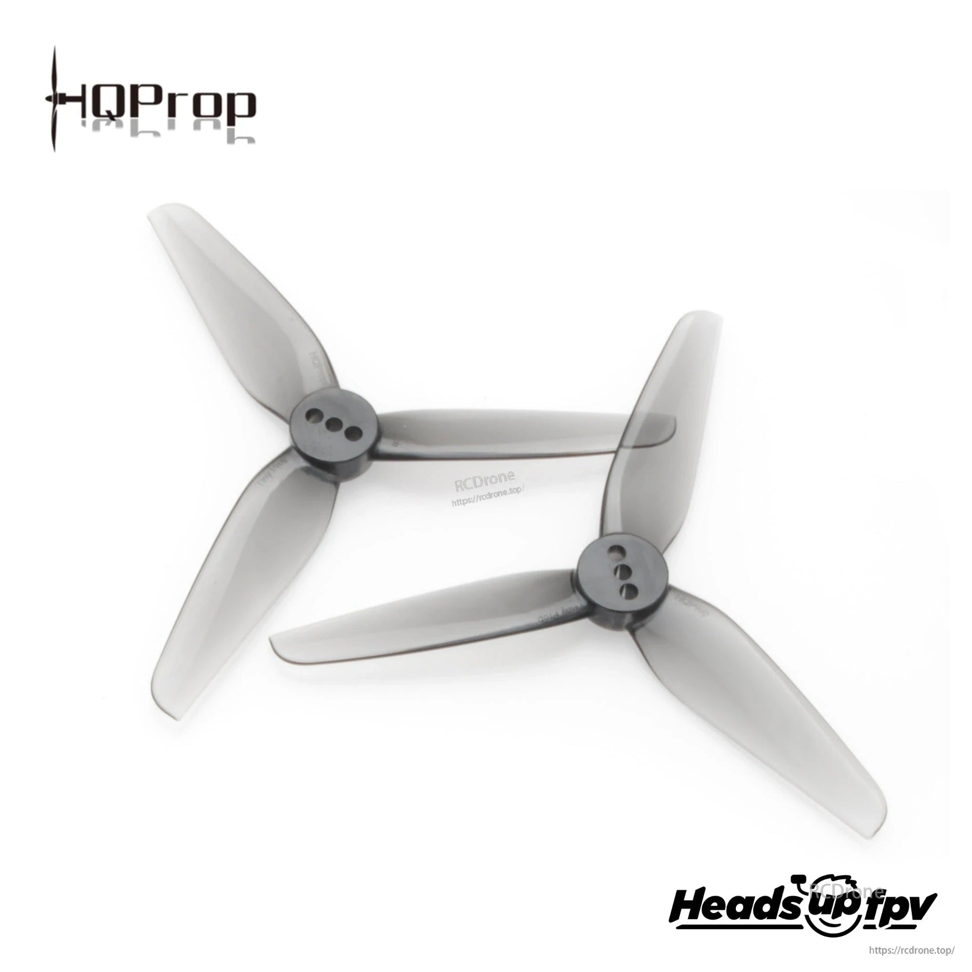 Smoke gray 3-inch 3-blade polycarbonate drone propellers, top view showing hub and blade shape