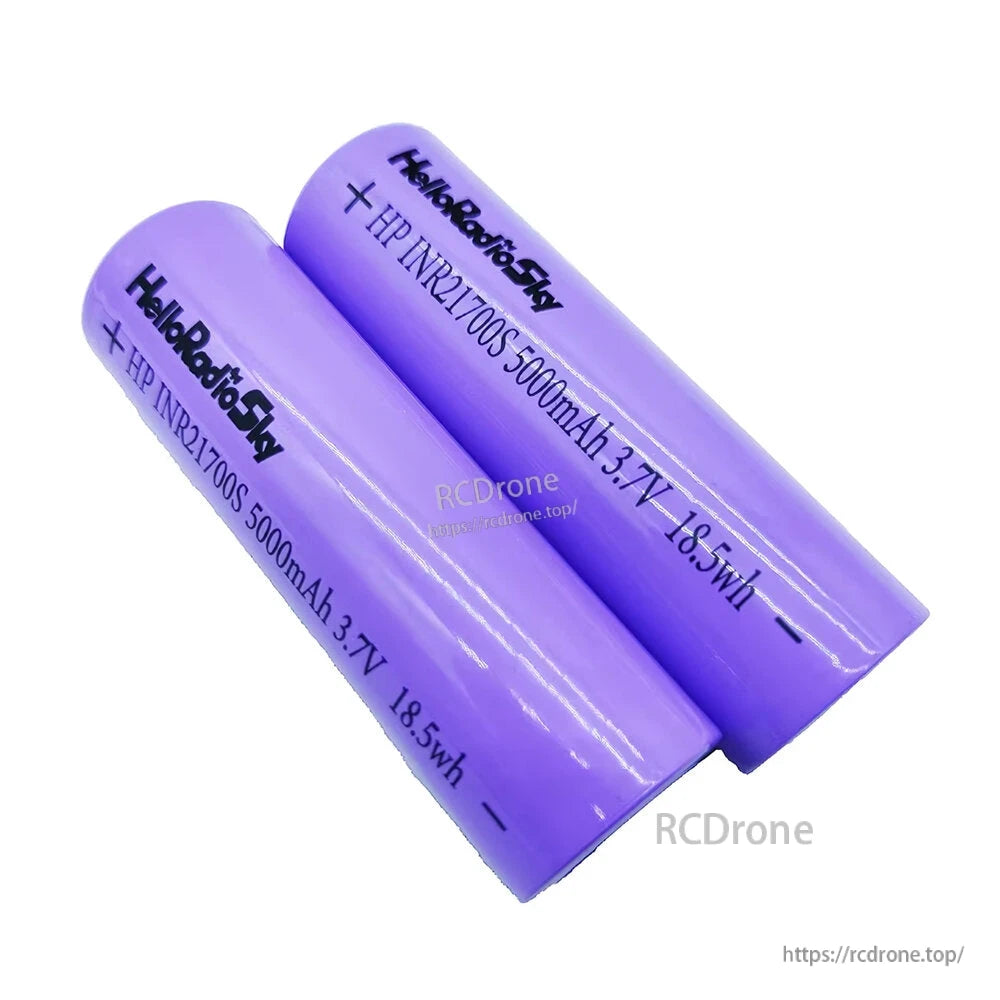 Close view of printed label on purple 21700 cells showing 5000mAh 3.7V 18.5Wh text