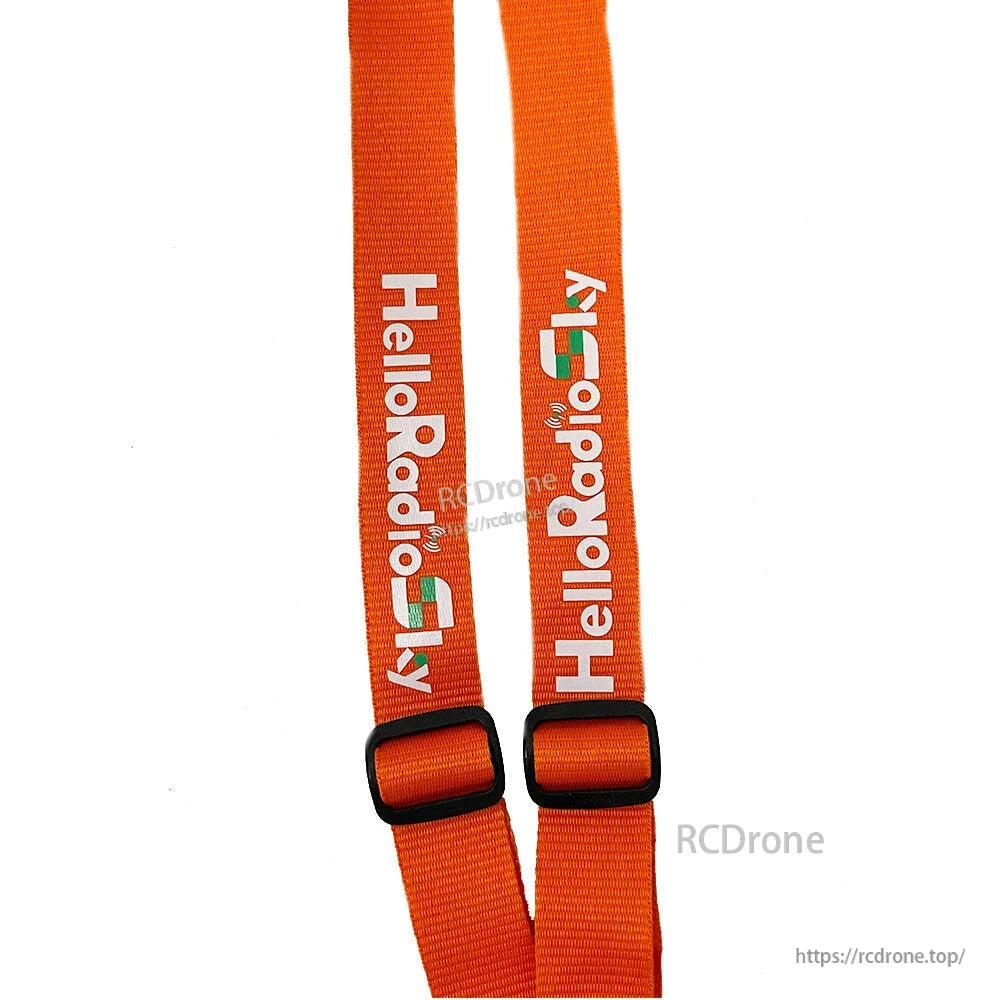 Close-up of orange strap webbing with HelloRadioSky print and two black length adjustment sliders