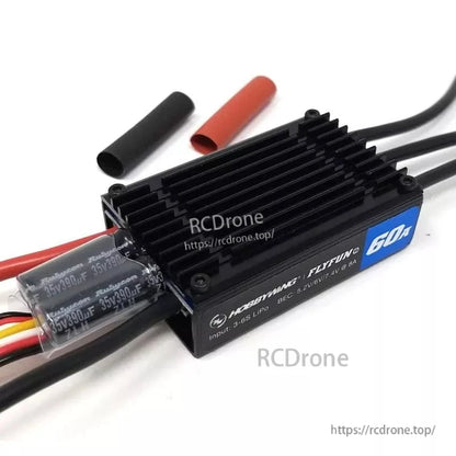 Hobbywing FlyFun 60A V5 ESC with finned heatsink, input 3–6S LiPo label, and attached power leads and capacitors
