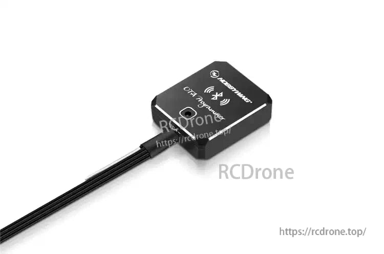 Hobbywing OTA programmer module with attached cable and plug connector in a compact black square housing