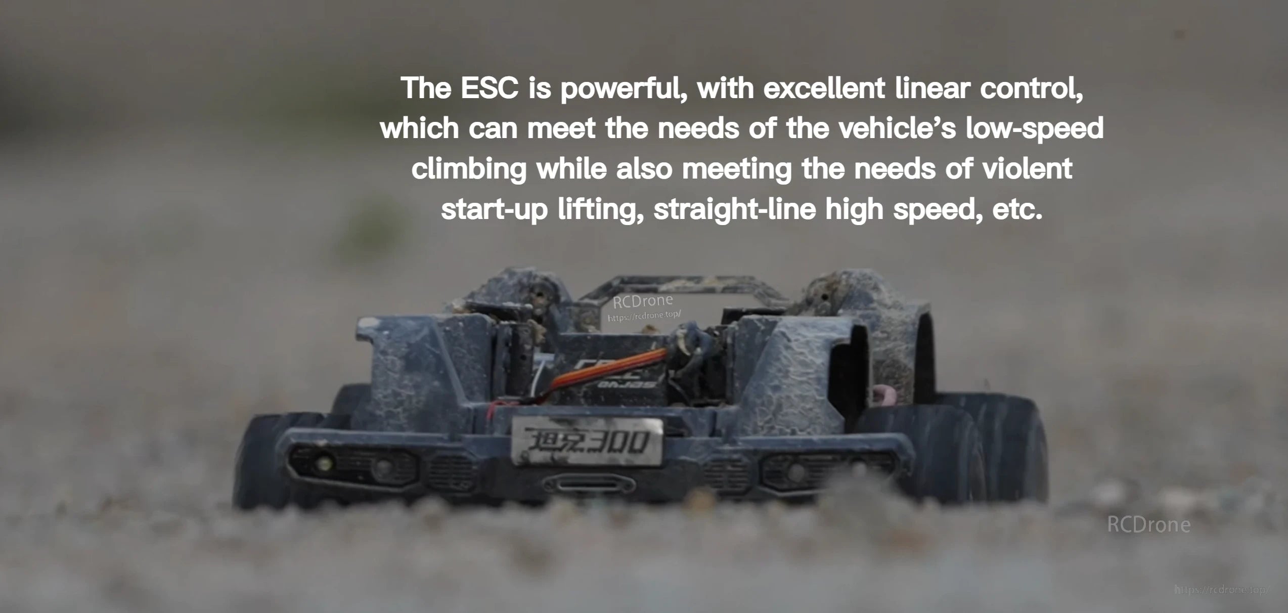 RC rock crawler driving through dirt with on-screen text about a powerful ESC and excellent linear control