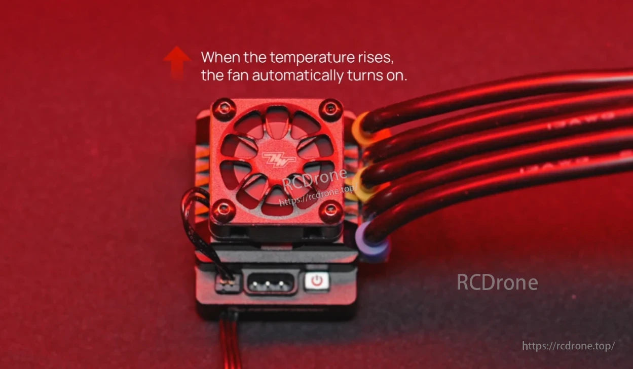 Close-up of Hobbywing XeRun XR10 PRO Legacy Edition ESC with cooling fan, power button, and connected motor wires