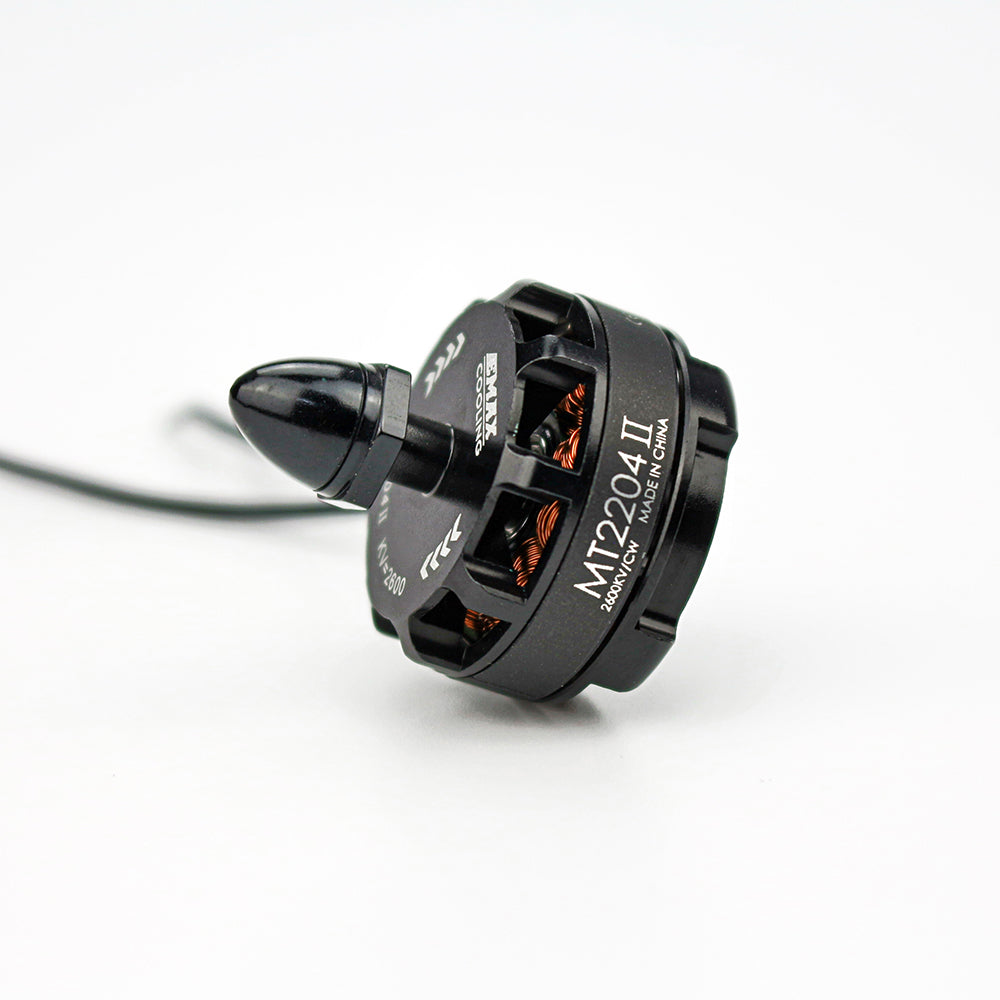 Single MT2204 II motor angled side view showing 2600KV label, exposed copper windings and wire lead