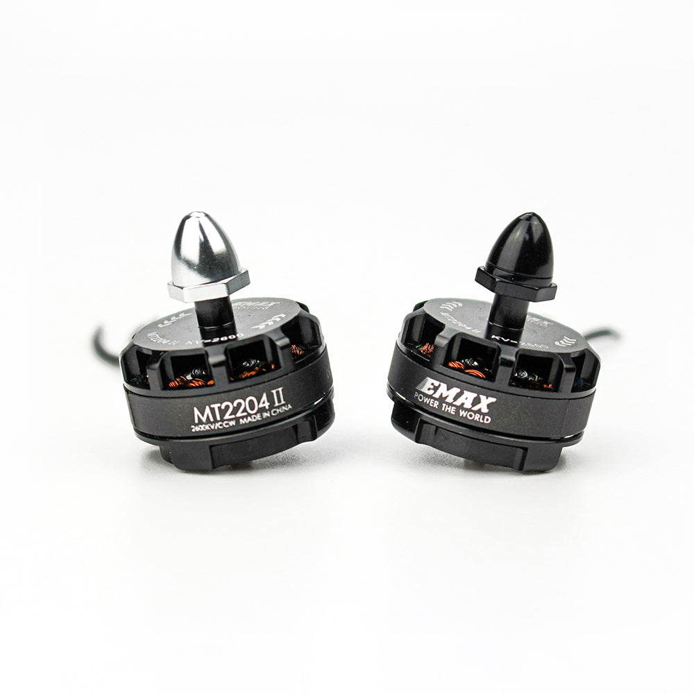 Emax MT2204II 2600KV brushless motor pair with prop adapter nuts, black finish, front angle view