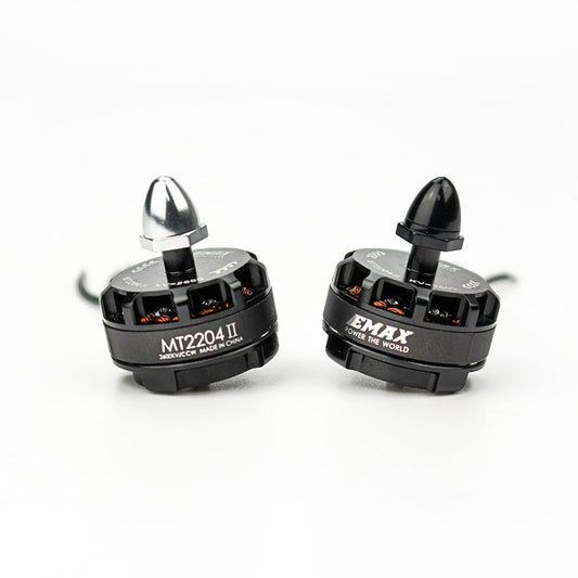 Emax MT2204II 2600KV brushless motor pair with prop adapter nuts, black finish, front angle view