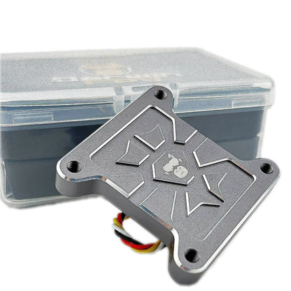 HULK FPV VTX underside plate with four mounting holes, shown in front of clear storage box