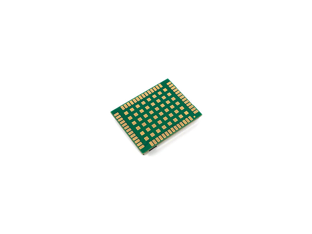 BT-B201E module underside close-up showing green PCB and gold BGA pads at angle