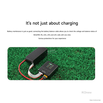 ISDT 608PD RC battery charger with color screen connected to a pack via balance lead and main power cable
