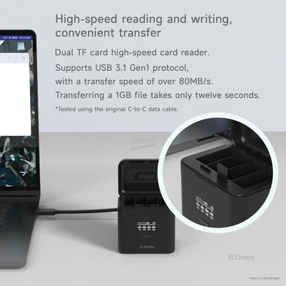 ISDT ActionGo ACG247 power bank charger with dual TF card reader slots, connected to a laptop via USB