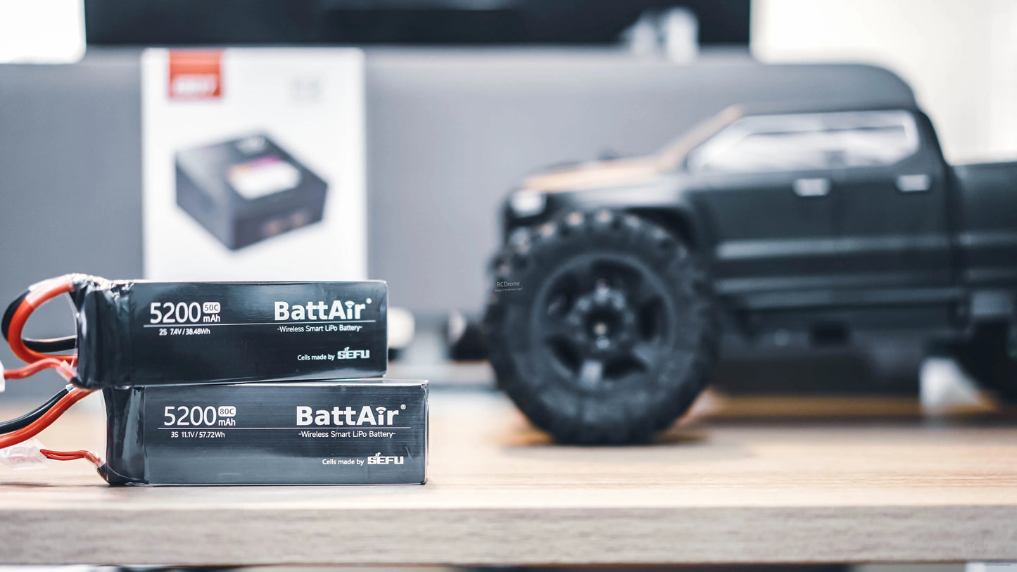 ISDT BattAir Smart RC LiPo Battery, Two ISDT BattAir wireless smart LiPo RC batteries, 5200mAh packs labeled 2S 7.4V and 3S 11.1V.