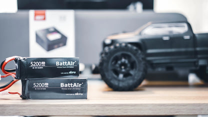 ISDT BattAir Smart RC LiPo Battery, Two ISDT BattAir wireless smart LiPo RC batteries, 5200mAh packs labeled 2S 7.4V and 3S 11.1V.