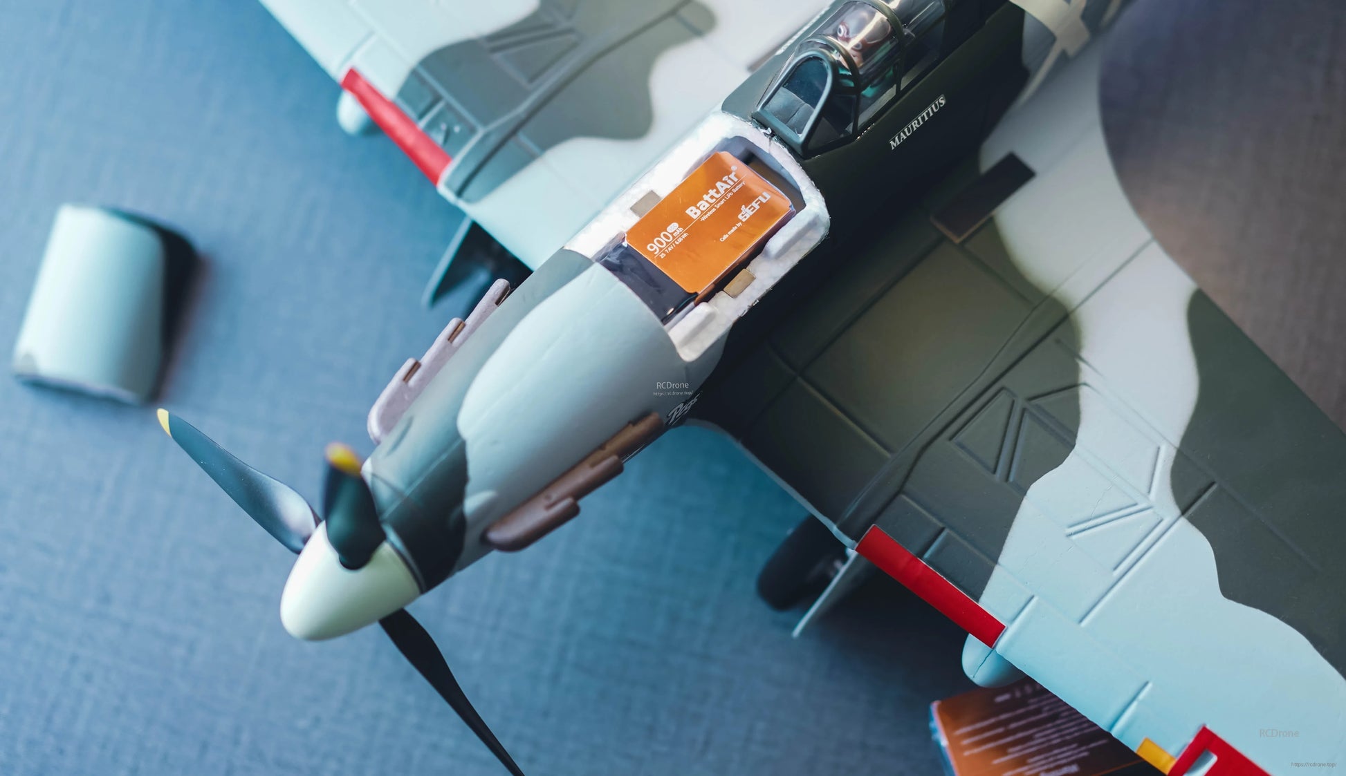 ISDT BattAir smart RC LiPo battery pack (900mAh) installed in the battery bay of an RC airplane