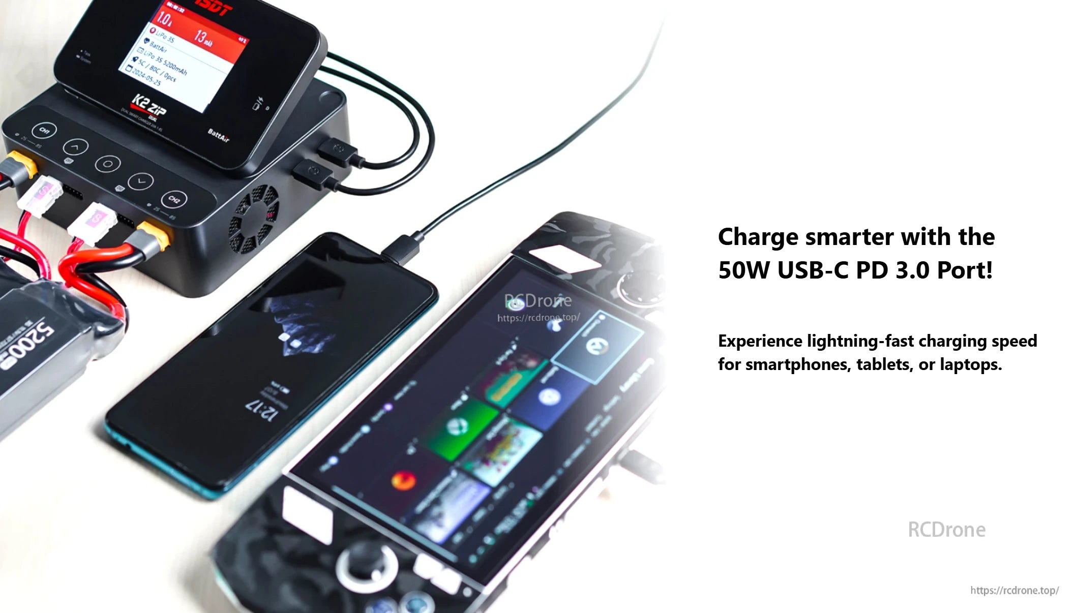 ISDT K2 Zip dual battery balance charger with dual outputs and 50W USB-C PD 3.0 port charging a phone