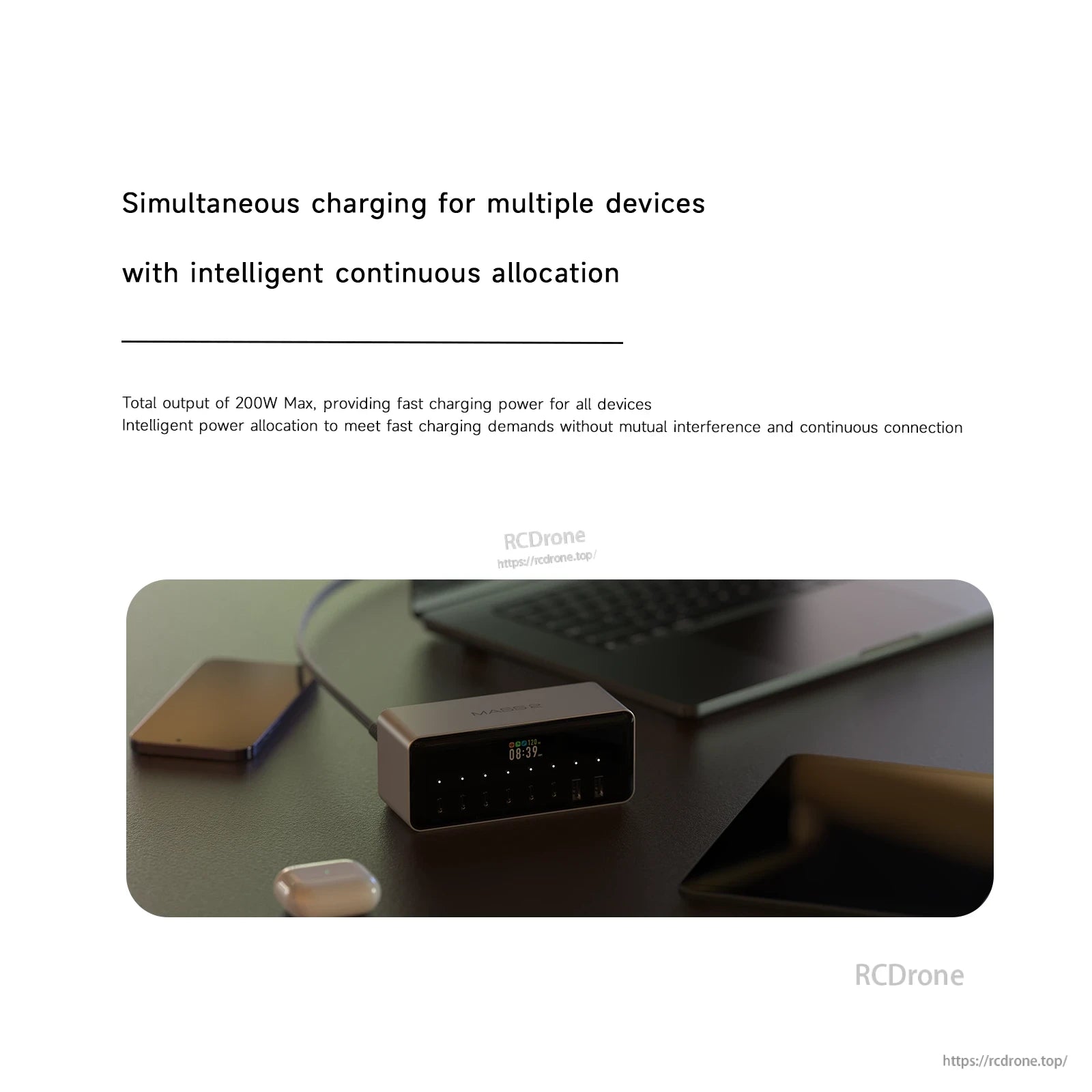 ISDT MASS2 desktop power station on a desk with digital display, designed for simultaneous charging up to 200W max