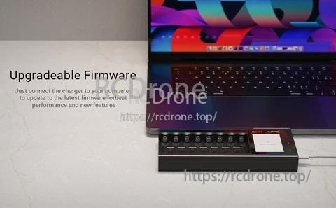 ISDT N8 battery charger connected to a laptop, highlighting upgradeable firmware via computer update