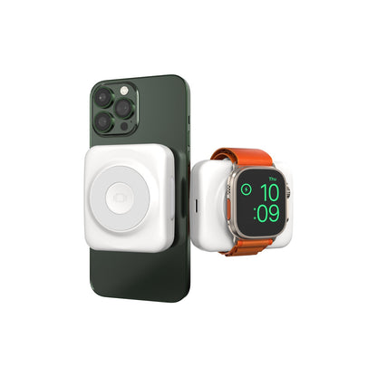 ISDT PB25DW Portable Charger Power Bank, White portable power bank with magnetic wireless charging pad attached to a smartphone and a smartwatch