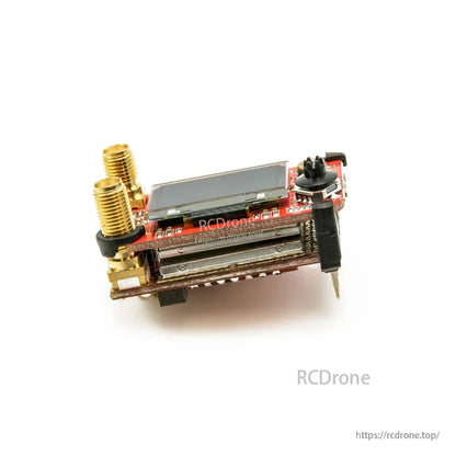 Goggle receiver module side view with module bay edge connector pins and dual SMA antenna ports
