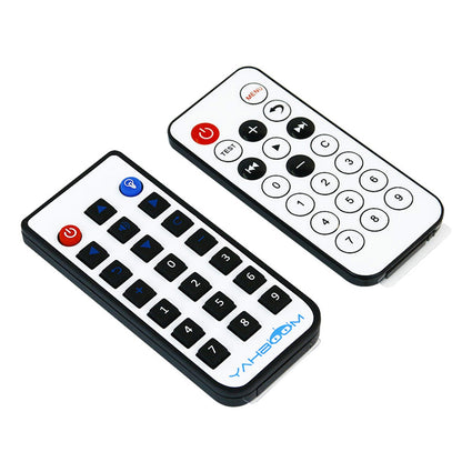 Two Yahboom infrared remote controllers with numeric keypad, power and menu buttons in a compact handheld design