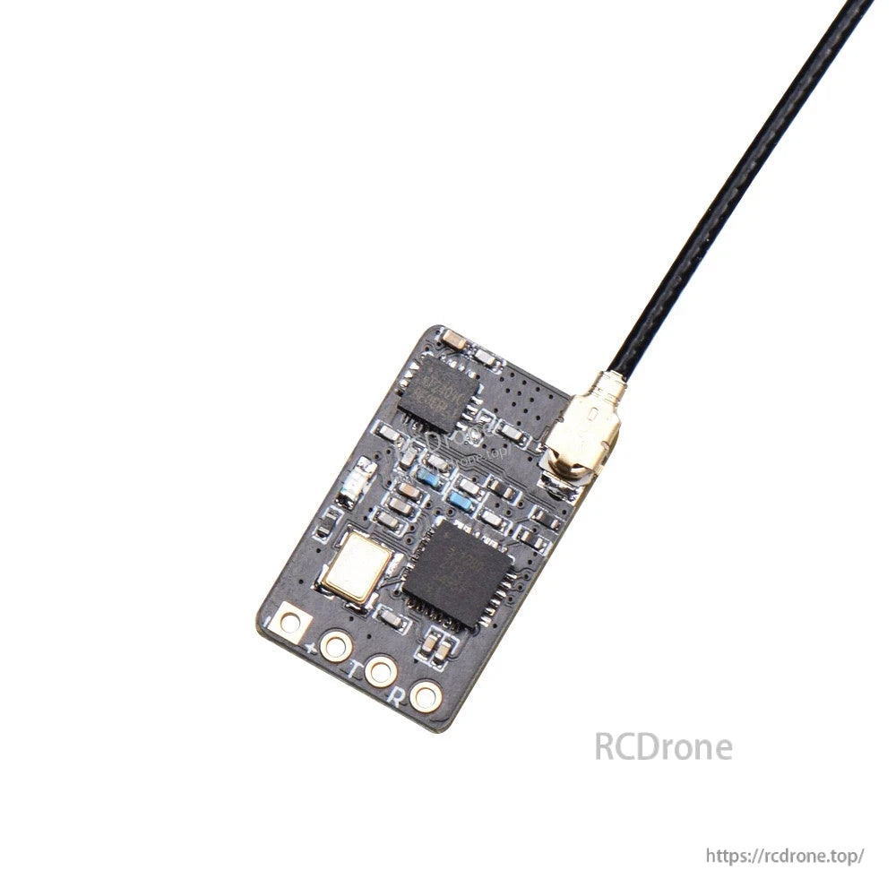 Close-up of RX24T ExpressLRS receiver board with antenna connector and surface components