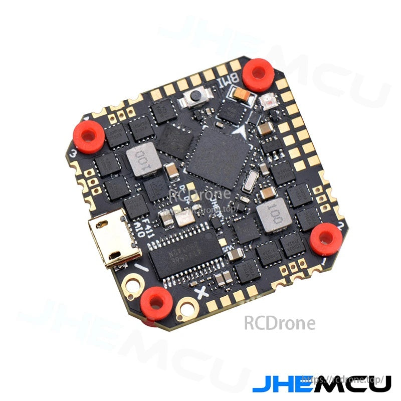 Angled view of the AIO flight controller showing component layout, corner mounting holes, and micro USB access