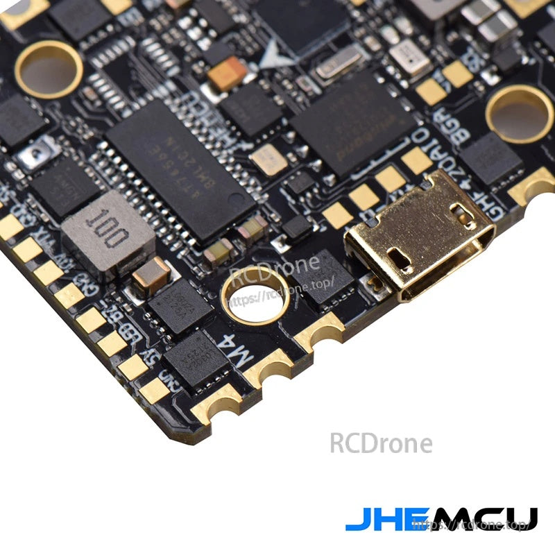 Close-up of Micro USB port area and edge pads on JHEMCU GHF420AIO-BGA AIO flight controller