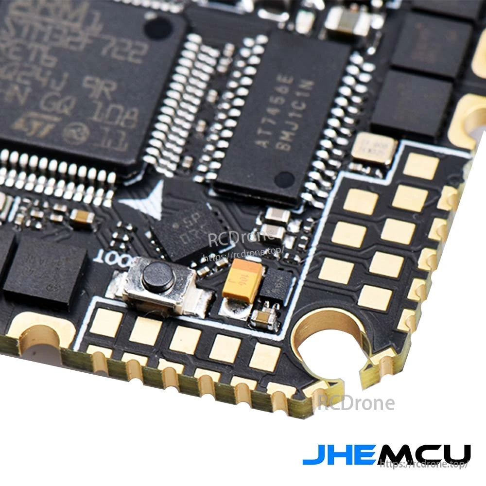 Close-up of the DFU button and component area on the GHF722AIO-ICM flight controller PCB