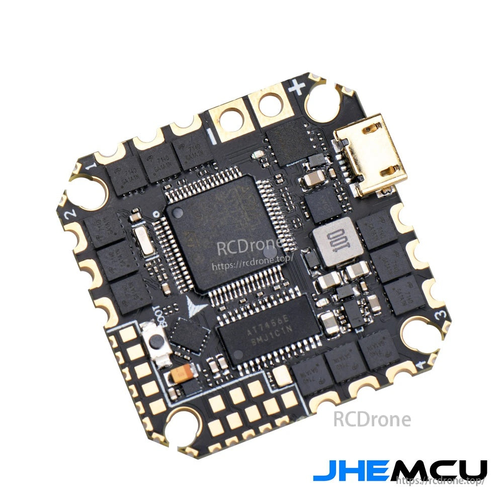 Back side of the JHEMCU GHF722AIO-ICM AIO flight controller with AT7456E OSD chip and solder pads