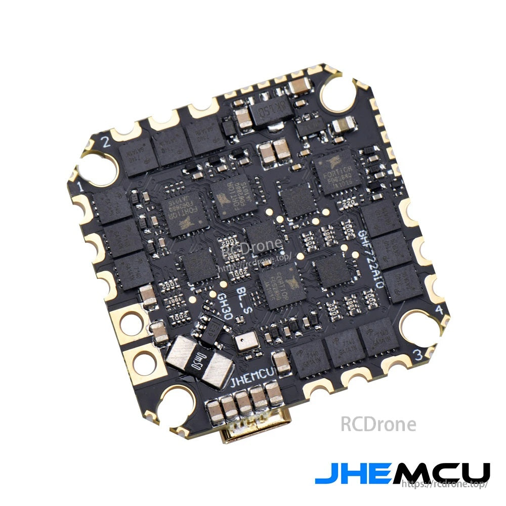 JHEMCU GHF722AIO-ICM AIO FC/ESC board angle view highlighting MOSFET layout and motor pad edges