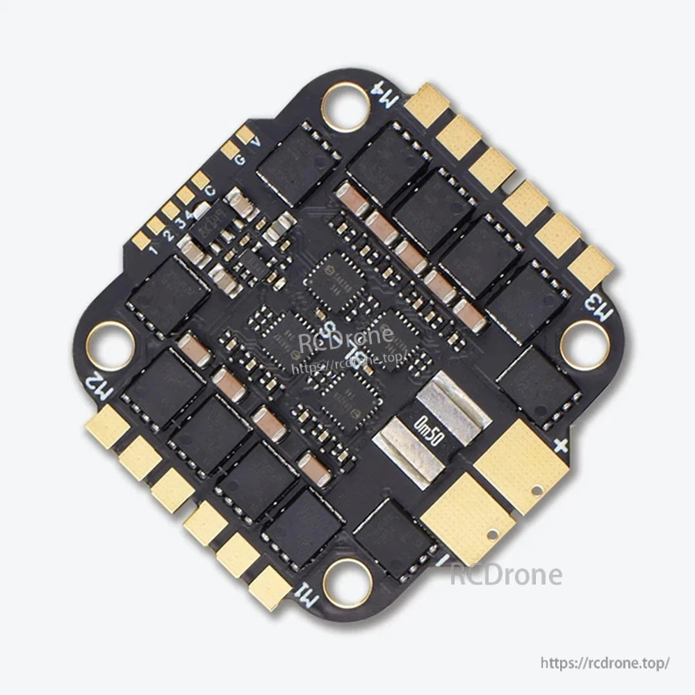 Close-up of the 4-in-1 ESC PCB showing MOSFET layout, current shunt area, and battery +/− pads