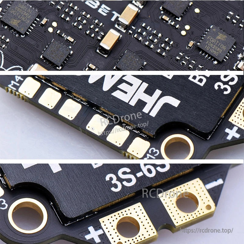 Close-up of ESC solder pads and battery power pads (+/–) with large through-hole connection points