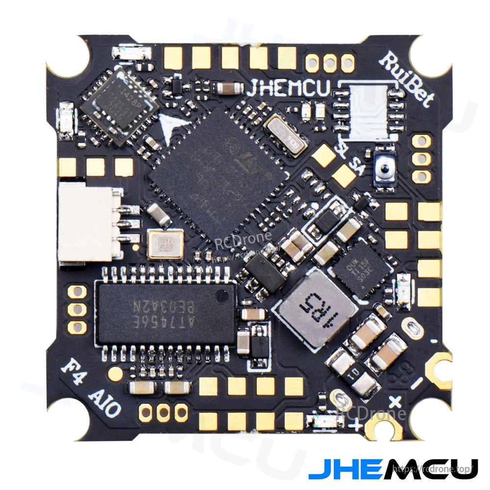 Close-up of Ruibet F4AIO 12A board components and solder pads for receiver, VTX, camera, and power connections