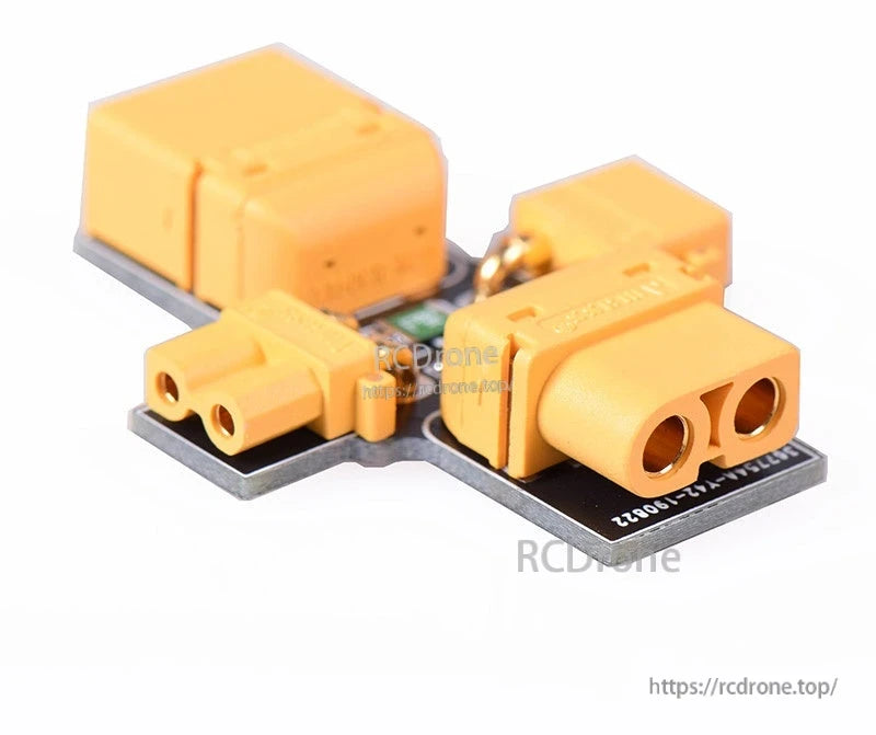 Angled side view of XT30/XT60 smoke stopper fuse holder showing connector ports and PCB edge