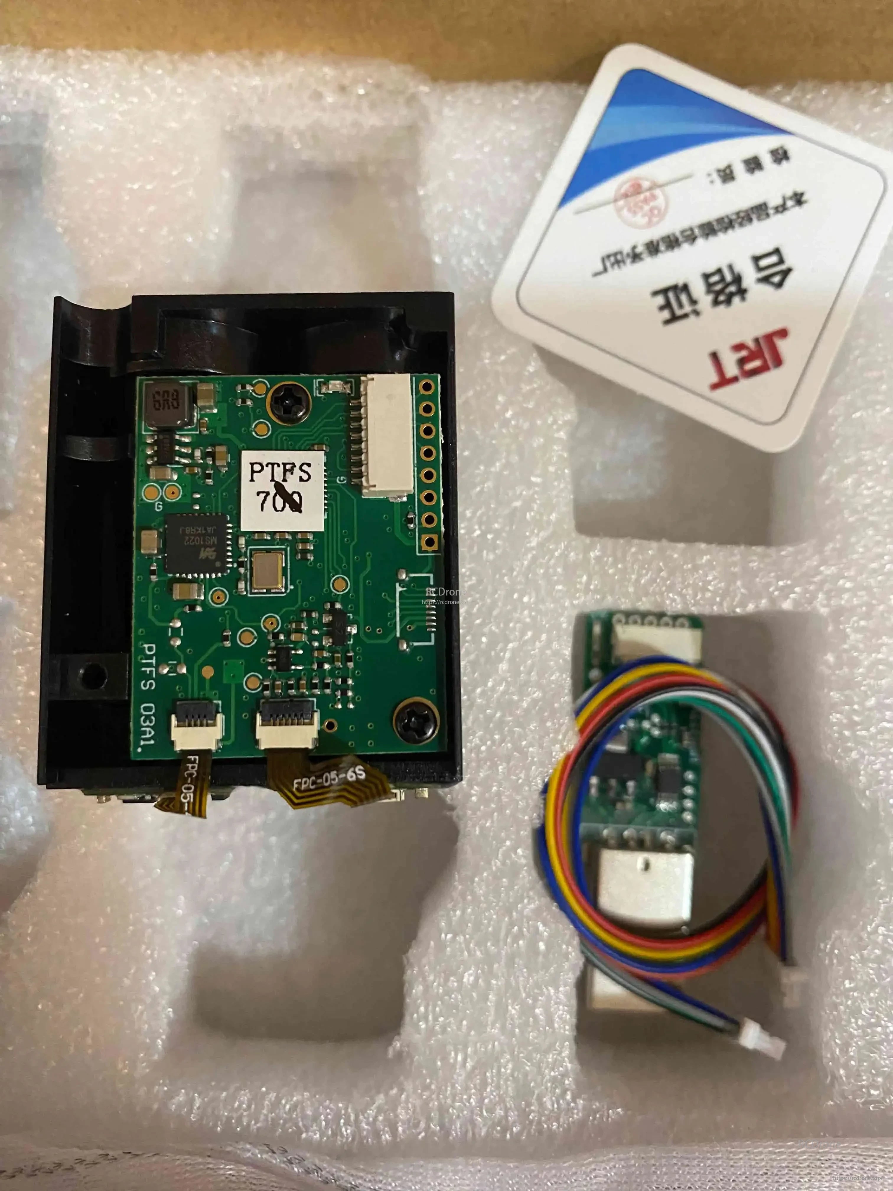 JRT TOF Laser Lidar includes PTF5 circuit board, certification, and cable for reliable distance measurement and connectivity.