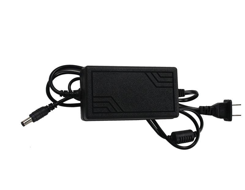 Side view of Jetson Nano power supply brick with US wall plug and DC barrel connector