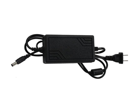 Side view of Jetson Nano power supply brick with US wall plug and DC barrel connector