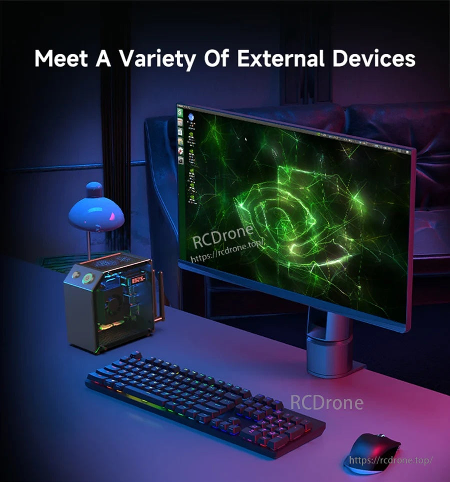 Desktop setup with the compact Jetson case connected to a monitor, keyboard, and mouse for external device use