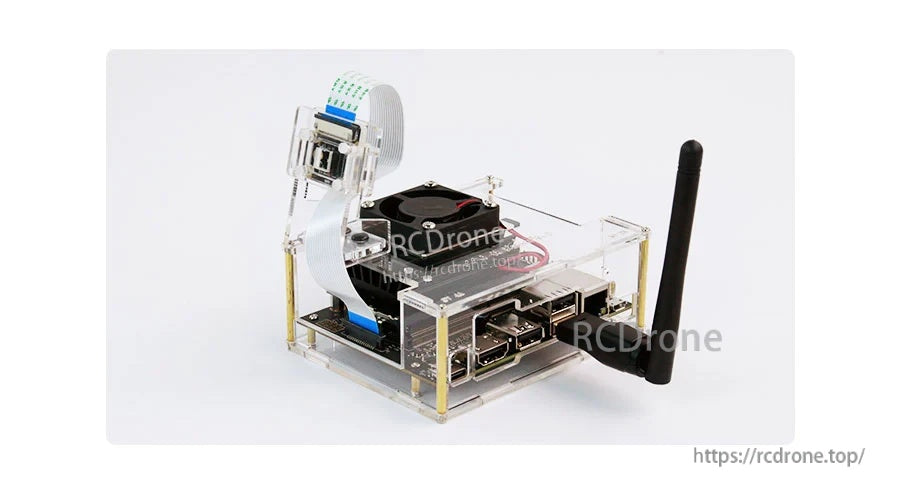 Side view showing clear acrylic enclosure with fan opening and access to USB, Ethernet, and display connectors