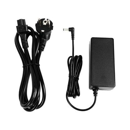 Power adapter kit layout showing AC mains cable, DC lead with right-angle barrel connector, and adapter brick