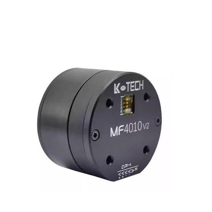 Angled view of MF4010 v2 motor housing showing front plate, mounting holes and compact cylindrical body