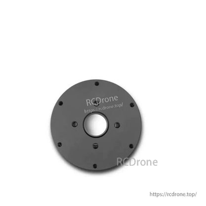 Rear face of motor with center bore and perimeter mounting screws, flat backplate view