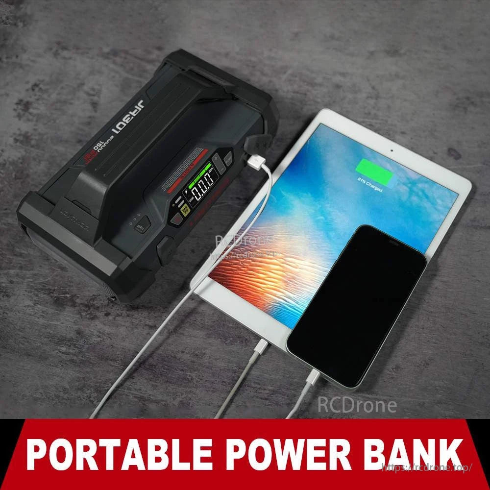 LOKITHOR JA301 portable jump starter power bank charging a tablet and smartphone via USB with LCD display