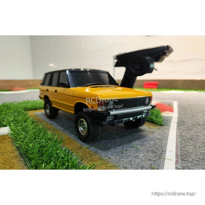 Landa LD18401 1/18 RC Car, Yellow 1/18 scale RC SUV with 4WD, 2.4G proportional control, ready-to-run off-road climber for rugged terrain adventures.