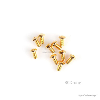 Gold M3 Phillips pan head machine screws, short length set spread out on white background