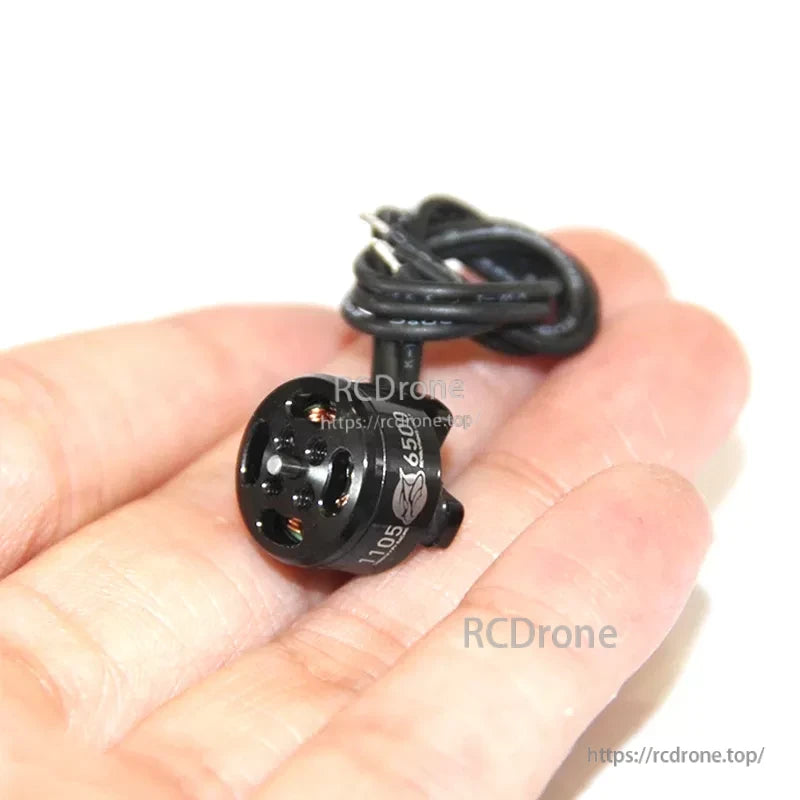 MAD 1105 KV6500 FPV racing brushless drone motor with black housing and attached wires in hand