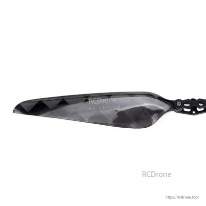 MAD FLUXER Pro glossy carbon fiber folding propeller blade with geometric pattern and folding hinge mount