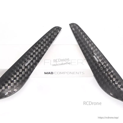 Pair of MAD FLUXER 28x8.4 carbon fiber propeller blades with woven finish for counter-rotating setup